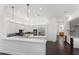 Contemporary kitchen with quartz countertops, stainless steel appliances, and ample cabinet space at 9907 Beaufort Ct, Windermere, FL 34786