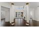 Bright living room featuring soaring ceilings, fireplace, and views of the pool at 9907 Beaufort Ct, Windermere, FL 34786