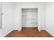 Open closet provides ample storage with shelving, and a window allows in natural light at 10423 Manassas Cir, Orlando, FL 32821