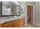 The bathroom includes double sinks, granite countertops, and a separate toilet room at 10435 Eastpark Lake Dr, Orlando, FL 32832