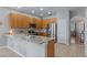 Modern kitchen with stainless steel appliances, granite countertops, and ample cabinet space at 10435 Eastpark Lake Dr, Orlando, FL 32832