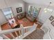 Open concept living and dining area with wood floors and plenty of natural light at 10435 Eastpark Lake Dr, Orlando, FL 32832