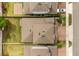 An aerial view shows the roof, driveway, and fenced-in backyard at 1109 Castlevecchio Loop, Orlando, FL 32825