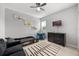Fun bedroom with a race car bed, flat screen TV, race car art, and modern ceiling fan at 1109 Castlevecchio Loop, Orlando, FL 32825