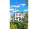 Stylish two-story home with dark shutters and manicured landscaping for curb appeal at 1117 Damask St, Celebration, FL 34747