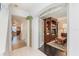 An inviting living room featuring hardwood floors, a custom entertainment center, and neutral walls at 1117 Damask St, Celebration, FL 34747