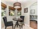 Cozy breakfast nook features two windows, a small table, and comfortable seating at 11506 Clair Pl, Clermont, FL 34711