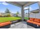 Inviting outdoor patio offering views of the backyard and privacy fence at 1210 Pando Loop, Orlando, FL 32824