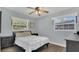 Neutral bedroom with hardwood floors, lots of sunlight, and plenty of closet space at 132 W Lauren Ct, Casselberry, FL 32730