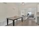 Dining room with bright walls, seamless floors and adjacent sitting space at 132 W Lauren Ct, Casselberry, FL 32730