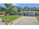 Charming single-story home with a well-maintained lawn and inviting curb appeal at 132 W Lauren Ct, Casselberry, FL 32730