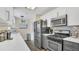 Bright and stylish kitchen with stainless steel appliances and plenty of counter space at 132 W Lauren Ct, Casselberry, FL 32730