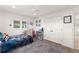 bedroom featuring gray trim and neutral walls at 1322 Palm Dr, Apopka, FL 32703