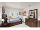 Bright bedroom with neutral walls and carpet floors at 1322 Palm Dr, Apopka, FL 32703