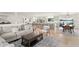 Spacious open floor plan with the kitchen, living, and dining areas flowing together seamlessly at 1322 Palm Dr, Apopka, FL 32703