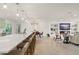 Bright open-concept living space with kitchen island, dining area, and comfortable lounge at 1322 Palm Dr, Apopka, FL 32703