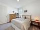 Cozy bedroom featuring a plush bed, dresser, and an abundance of natural light at 14001 Jomatt Loop, Winter Garden, FL 34787