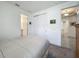 Comfortable bedroom with a neutral color palette and a connecting bathroom entrance at 14001 Jomatt Loop, Winter Garden, FL 34787