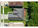 Overhead perspective highlighting the roof and backyard with a newly constructed deck and flourishing greenery at 145 Circle Hill Rd, Sanford, FL 32773