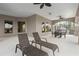 Over-sized balcony featuring lounge chairs with views of the lush surroundings and nearby lake at 14700 Avenue Of The Rushes, Winter Garden, FL 34787