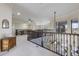 Second floor hallway provides access to other rooms in the house at 14700 Avenue Of The Rushes, Winter Garden, FL 34787