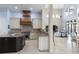 Gourmet kitchen with custom cabinetry, granite countertops, and stainless steel appliances at 14700 Avenue Of The Rushes, Winter Garden, FL 34787