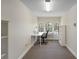 Bright office space featuring a white desk, neutral paint, carpeting, and natural lighting at 14700 Avenue Of The Rushes, Winter Garden, FL 34787