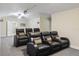 Well-equipped theater room featuring comfortable seating and a projector for movie nights at 14700 Avenue Of The Rushes, Winter Garden, FL 34787