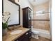 Well-appointed bathroom featuring a vanity with sink, cabinet, and shower-tub combo at 148 Oak View Cir, Lake Mary, FL 32746
