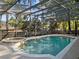 Backyard pool with enclosure and spa, offering a private outdoor space for leisure and gatherings at 148 Oak View Cir, Lake Mary, FL 32746