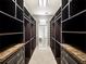 Spacious walk-in closet with custom shelving and drawers, providing ample storage at 148 Oak View Cir, Lake Mary, FL 32746
