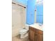 Bathroom features a toilet, sink with vanity, and tiled shower and tub at 1607 Northlake Dr # 1607, Sanford, FL 32773
