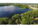 Overhead view of lake with beautiful foliage around it, creating a peaceful natural retreat at 1607 Northlake Dr # 1607, Sanford, FL 32773