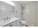 Modern bathroom with a white vanity, tiled shower, and new fixtures at 1617 Hontoon Rd, Deland, FL 32720