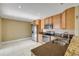 Eat-in kitchen features stainless steel appliances, granite countertops, and tile flooring at 1617 Hontoon Rd, Deland, FL 32720
