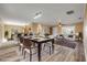 Open floor plan showcases a dining area, living room, and modern kitchen with bar seating at 1617 Hontoon Rd, Deland, FL 32720