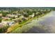 Aerial view of lake homes in a suburban neighborhood at 1802 Concert Rd, Deltona, FL 32738