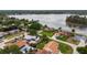 Residential neighborhood view, showing the home and its location within the community near the lake at 1802 Concert Rd, Deltona, FL 32738