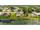 A beautiful home in the suburbs featuring a private pool and backyard facing the lake at 1802 Concert Rd, Deltona, FL 32738