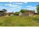 Beautiful home with a lush lawn, pool, and gazebo, surrounded by mature landscaping at 1802 Concert Rd, Deltona, FL 32738