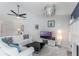 Bright living room with white sofas, geometric patterns and modern decor for a relaxing and stylish space at 1802 Concert Rd, Deltona, FL 32738
