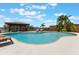 An inviting backyard pool and sundeck with lounge chairs and a shaded gazebo at 1802 Concert Rd, Deltona, FL 32738