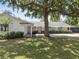 Well-maintained single-story home with mature landscaping, covered entrance, and a welcoming atmosphere at 2004 Mohawk Trl, Maitland, FL 32751
