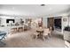 Open concept living space with dining area, modern kitchen, and exercise room at 2004 Mohawk Trl, Maitland, FL 32751