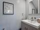 Contemporary bathroom featuring a sleek vanity with modern fixtures and stylish decor at 2012 Gold Spring Cv, Kissimmee, FL 34743