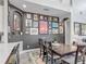 Dining room with a gallery wall, and modern decor is connected to a kitchen area at 2012 Gold Spring Cv, Kissimmee, FL 34743