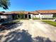 Charming single-story home featuring a private two-car driveway and well-maintained landscaping at 2348 Sun Valley Cir, Winter Park, FL 32792