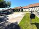 Charming single-story home featuring a private two-car driveway and well-maintained landscaping at 2348 Sun Valley Cir, Winter Park, FL 32792