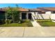 Inviting single-story home with well-manicured front yard and walkway to front door at 2348 Sun Valley Cir, Winter Park, FL 32792