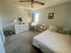 Bright bedroom with white dresser and desk, offering a comfortable and functional space at 240 Slade Dr, Longwood, FL 32750